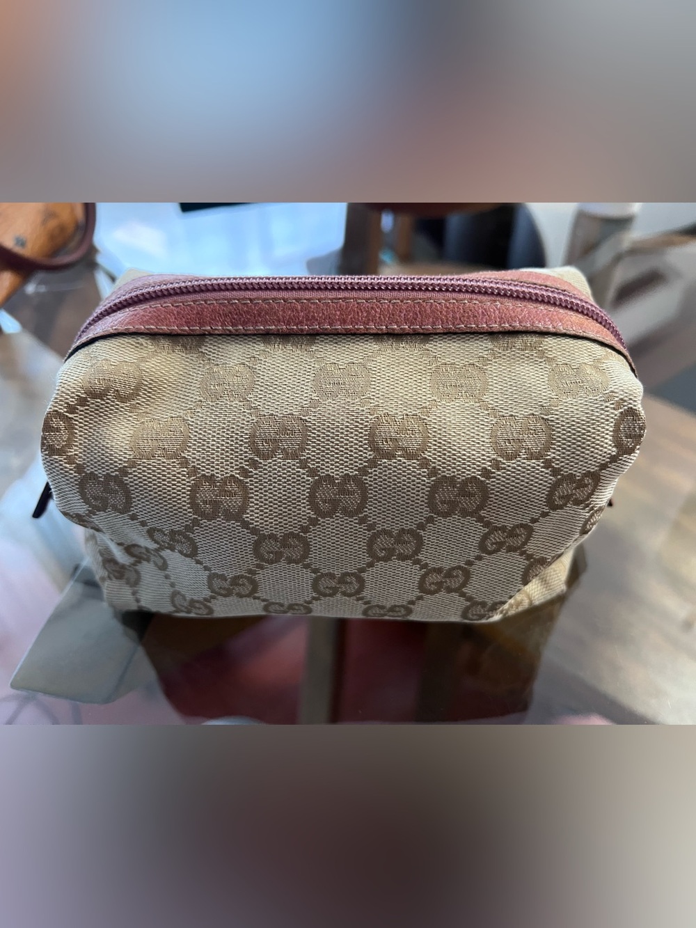 Authentic Gucci Beige Monogram Canvas Pouch with Pink Trim comes with COA